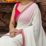 Women Fashion: व्हाइट साड़ी पर बेस्ट लगेंगे इन रंगों के ब्लाउज, दिखेंगी स्टाइलिश